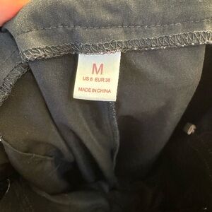 ROMWE skull graphic contrast binding pants